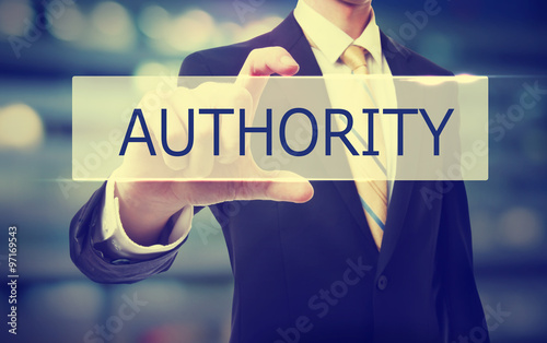 Business man holding Authority concept