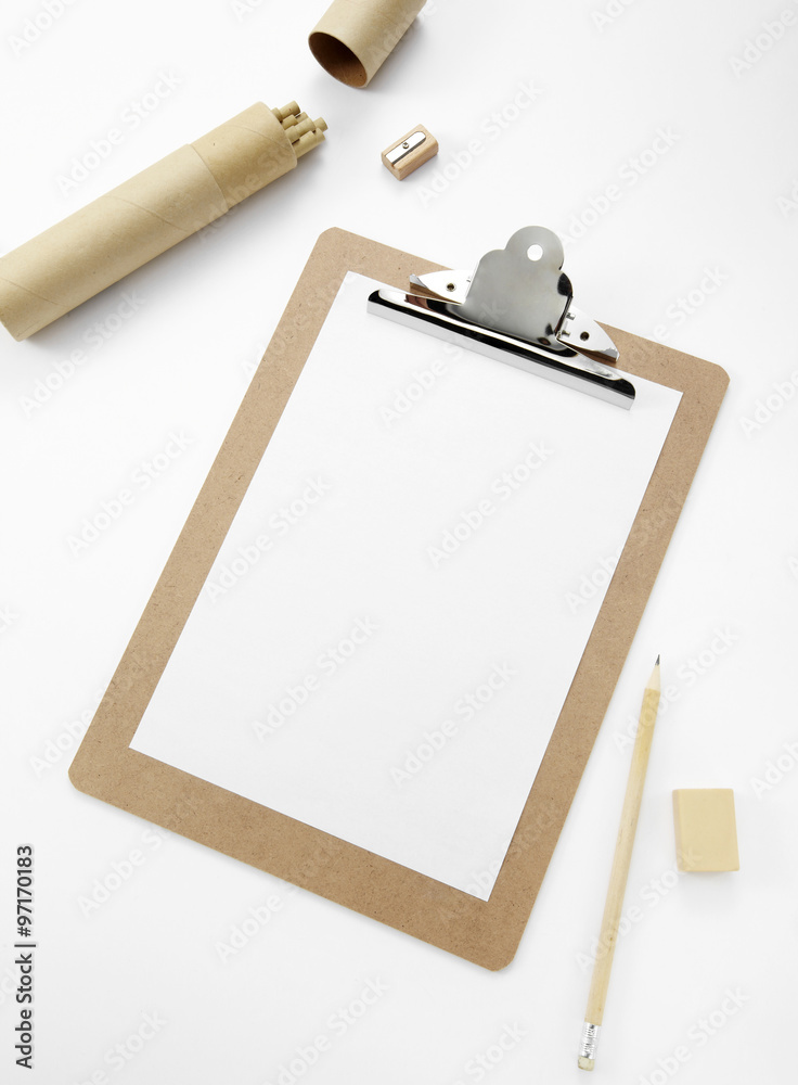 Record clips and pencils on white background Record clips and pencils on white background