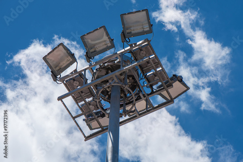 Stadium lights with blue sky background