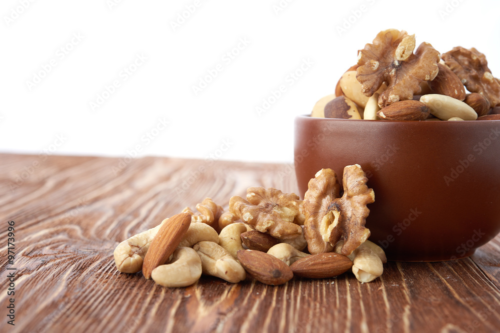 Fototapeta premium Mix nuts on wooden background
