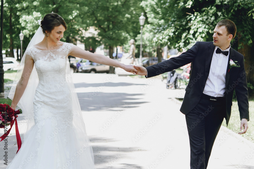 gorgeous happy luxury brunette bride and elegant stylish groom w gorgeous happy luxury brunette bride and elegant stylish groom w