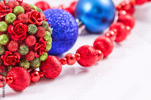 Christmas tree balls with red garland