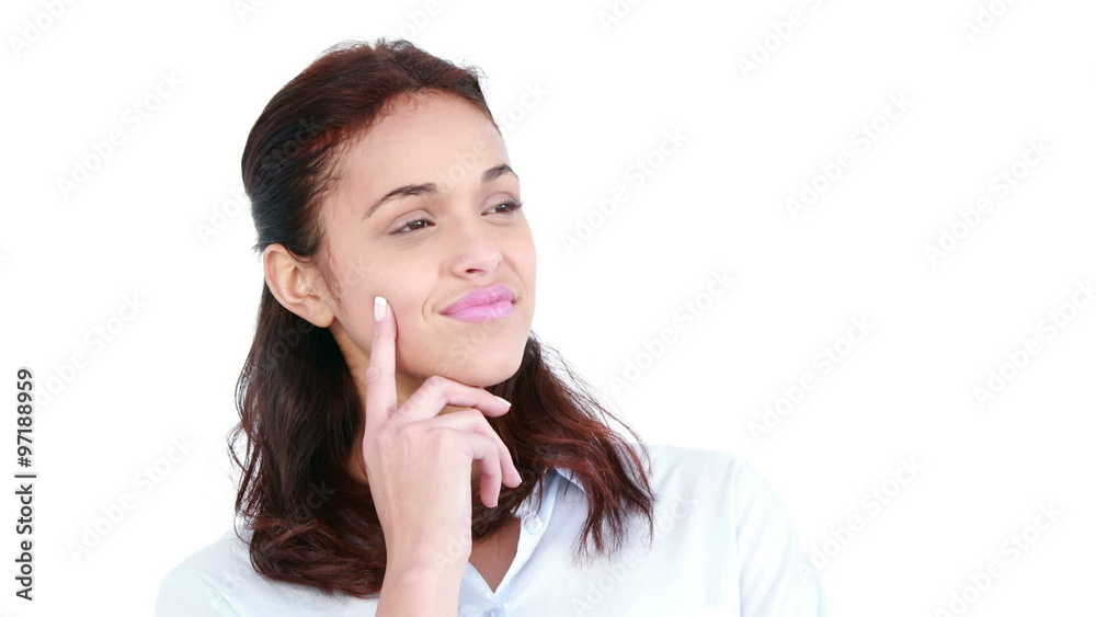 Happy casual woman thinking with hand on chin Happy casual woman thinking with hand on chin