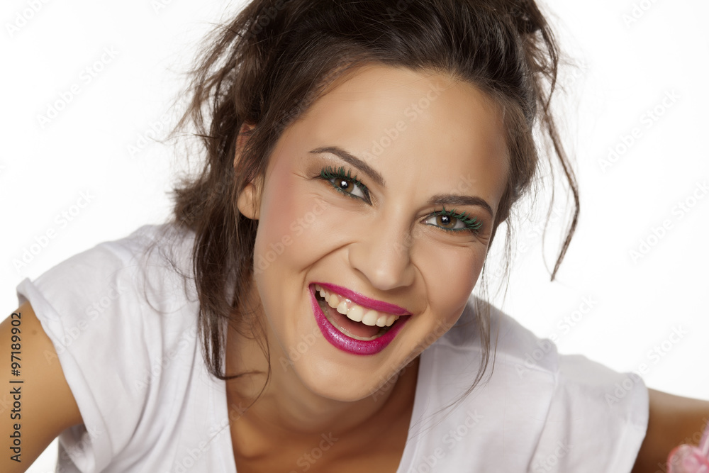 smiling beautiful young woman on a white background smiling beautiful young woman on a white background