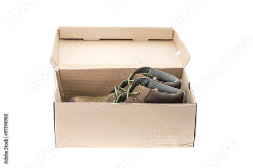 New brown shoe in box isolated on white