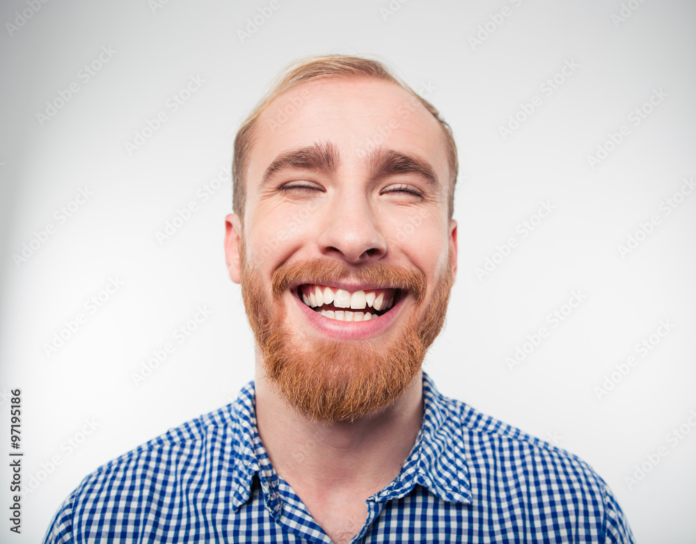 Obraz premium Closeup portrait of a casual man laughing