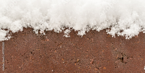 Snow on a Red Brick Wall © johndwilliams