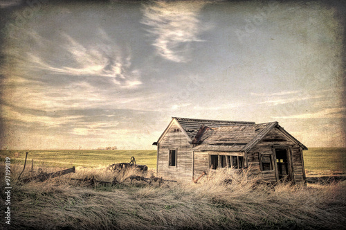 abandoned homestead on prairie photo