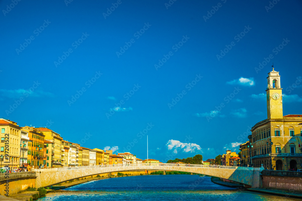 Obraz premium View of old street and river Arno in Pisa city, Italy
