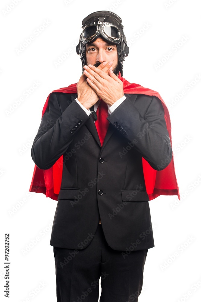 Fototapeta premium Super hero businessman covering his mouth
