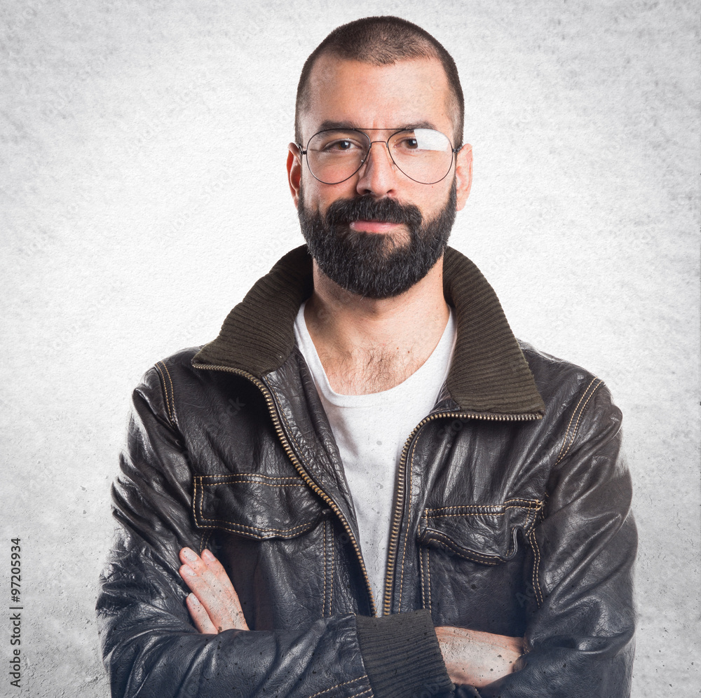 Fototapeta premium Man with leather jacket with his arms crossed