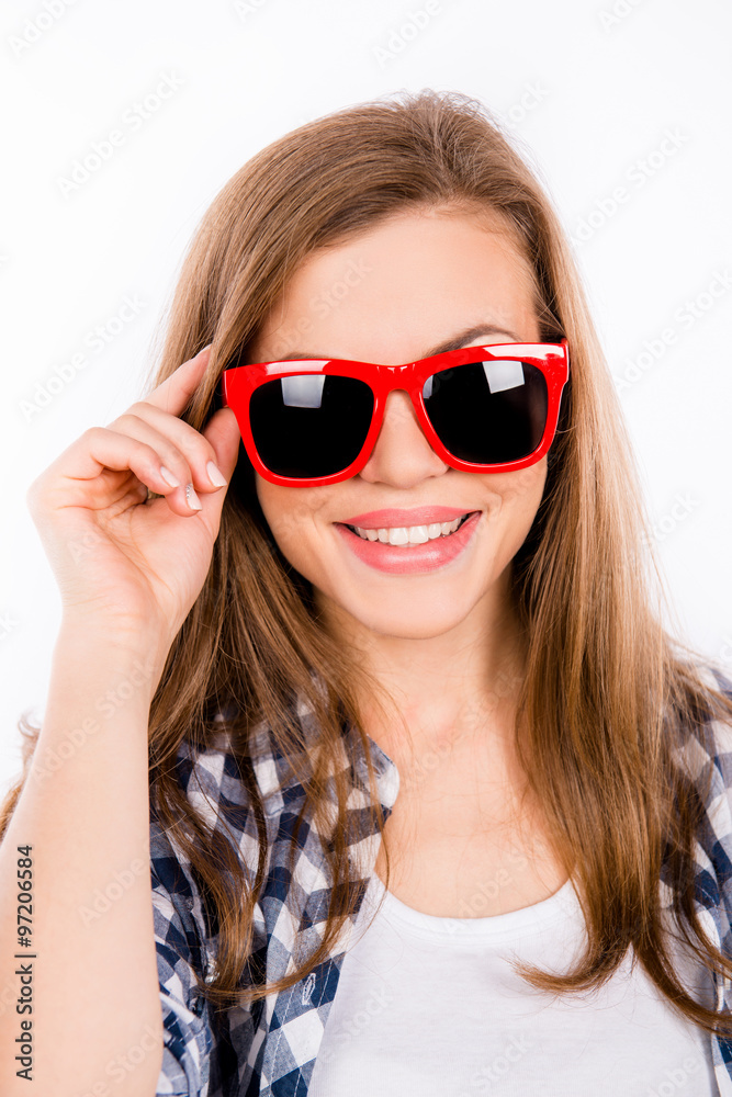 funny beautiful girl in glasses with a red rim smiling funny beautiful girl in glasses with a red rim smiling