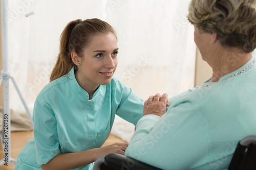 Wallpaper Mural Young caregiver in nursing home Torontodigital.ca