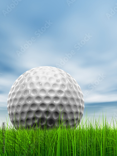 White golf ball in grass and sky