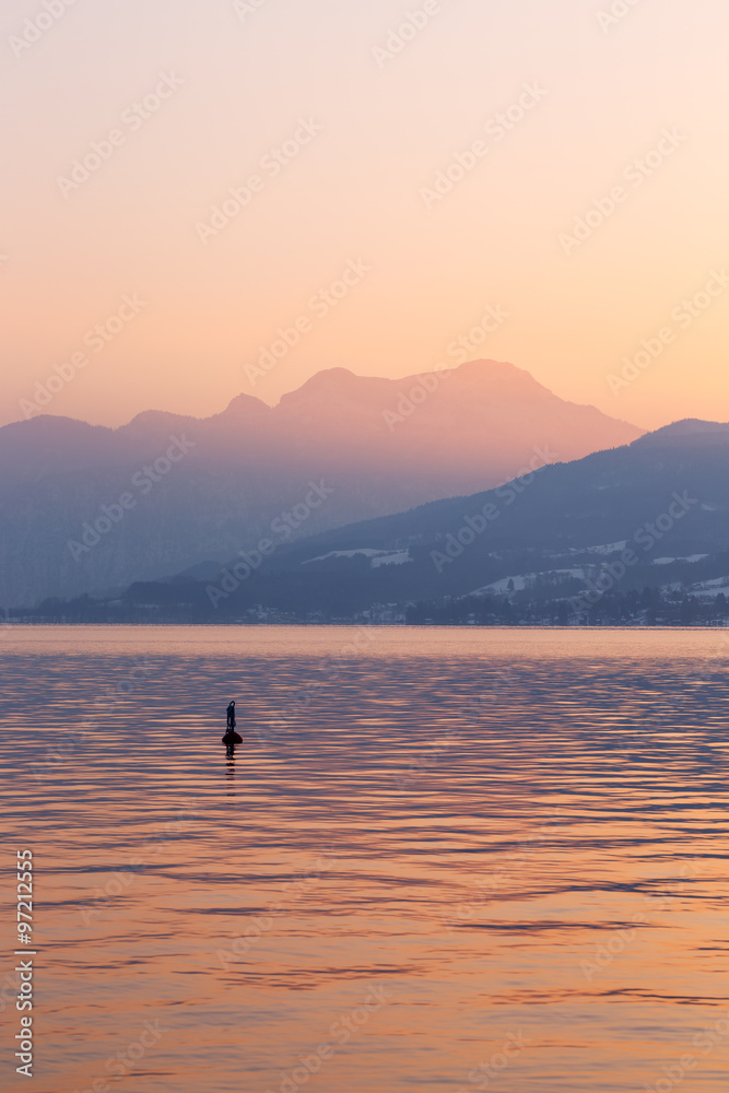 Sunset at lake Attersee, Salzkammergut, Austria with Schafberg Mountain
