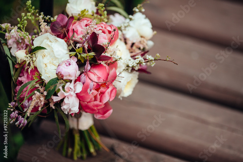 wedding decoration, bouquet on wooden background © tatyanasuyarova
