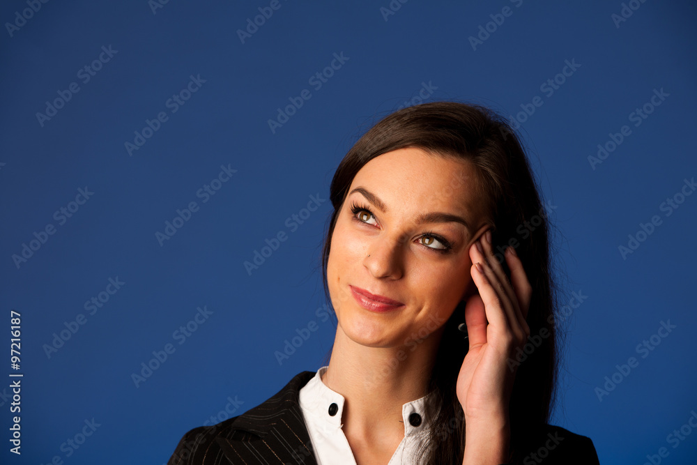 Happy woman pointing up with her finger - isolated over white
Happy woman pointing up with her finger - isolated over white