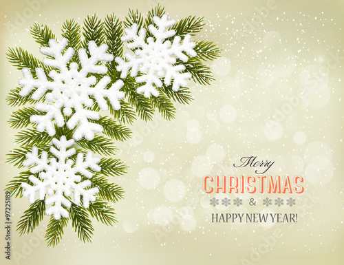 Snowflakes on christmas tree branches. Christmas holiday backgro