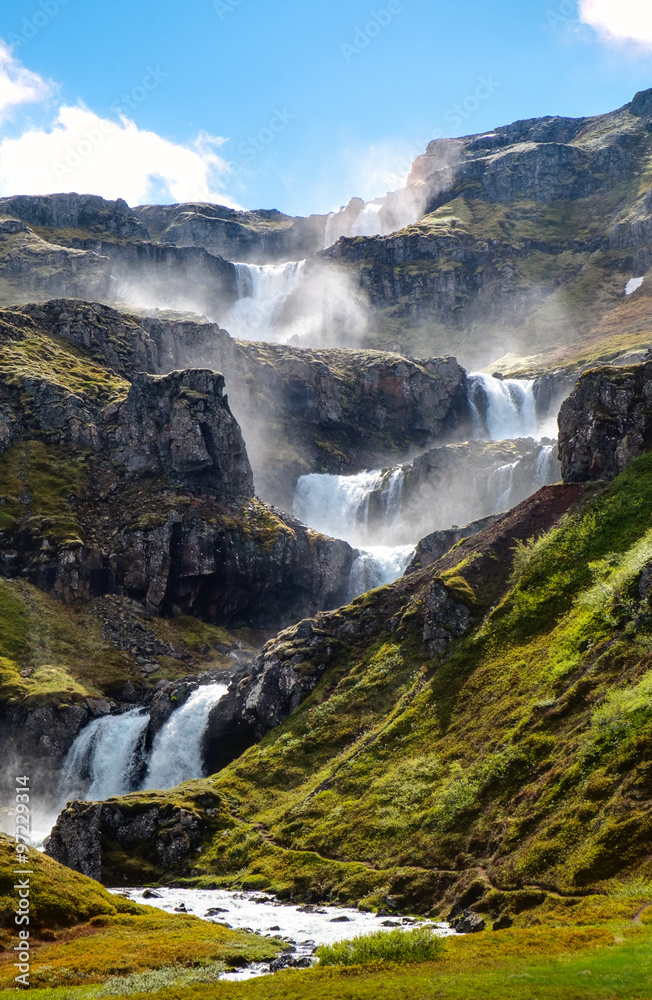 Obraz premium The cascades of the Klifbrekkufossar waterfall in Iceland