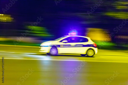 Speeding police car © Maksim Shebeko