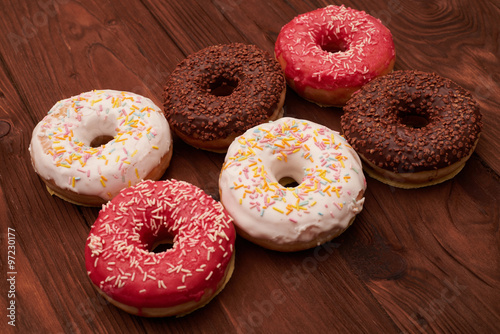 six colorful donuts