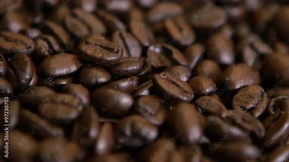 Coffee beans in 4k rotate perfectly on a turntable. Close up product shot. Coffee beans in 4k rotate perfectly on a turntable. Close up product shot.