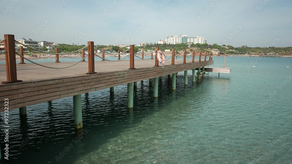 Emty wooden bathing pier with lifelines with beach and sea in a sunny day. 4k Emty wooden bathing pier with lifelines with beach and sea in a sunny day. 4k