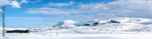Panoramic view of hotel building in the snowy mountains. Winter. Finse, Norway