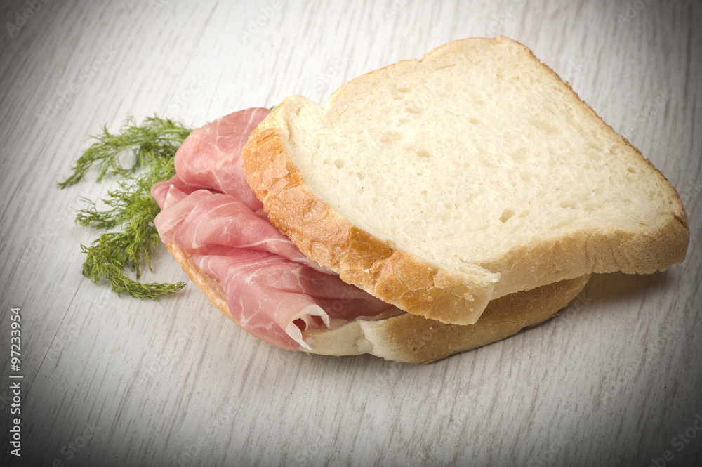 sandwich with Italian prosciutto crudo ,raw ham leg sliced