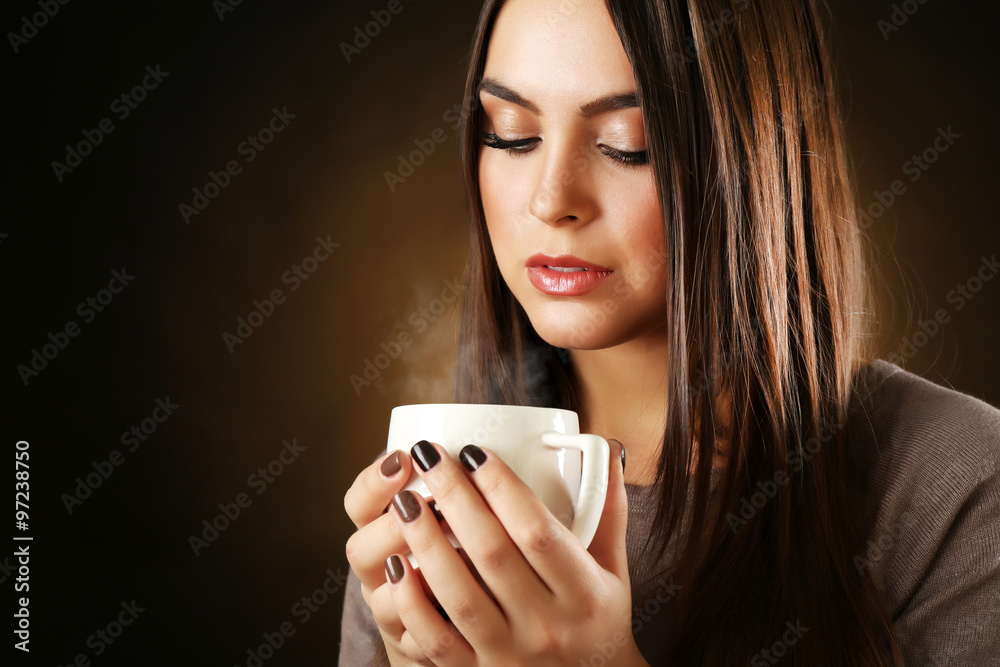 Portrait of pretty woman with cup of coffee, close up Portrait of pretty woman with cup of coffee, close up