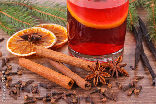 Fototapeta Naklejka Na Ścianę i Meble -  Mulled wine for christmas or winter evening with spices and spruce branches