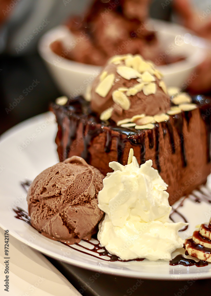 Chocolate ice cream honey toast with whip cream on dish Chocolate ice cream honey toast with whip cream on dish