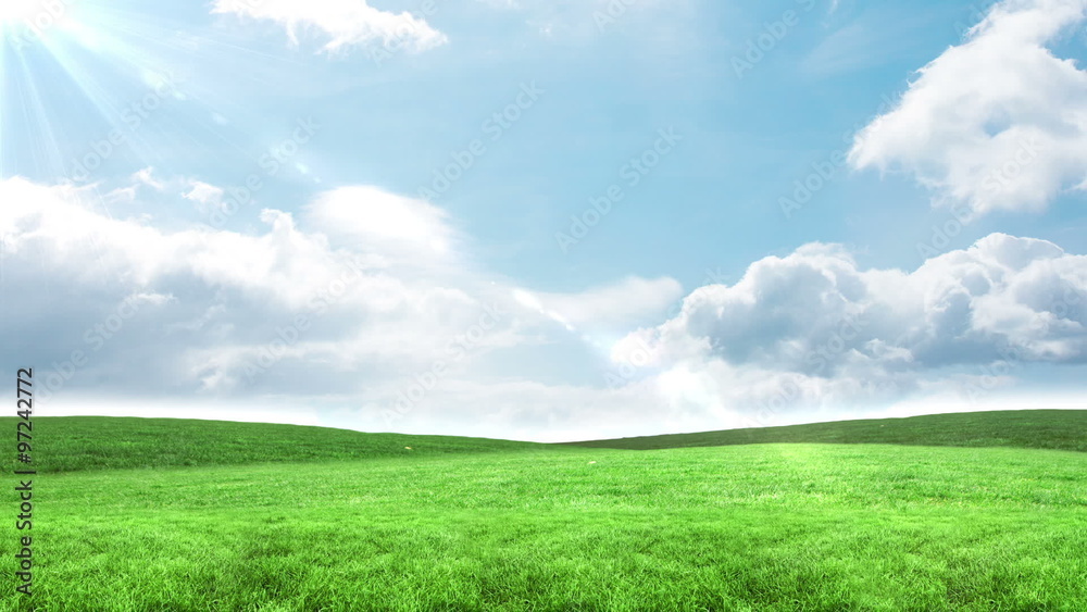 Blue sky over green field