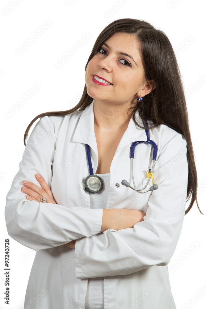 Portrait of young friendly beautiful female doctor with crossed arms and smiling Portrait of young friendly beautiful female doctor with crossed arms and smiling
