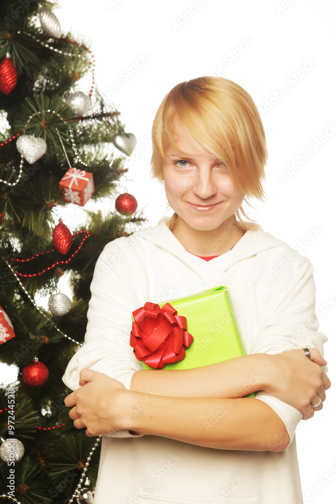 woman with gift box and christmas tree
