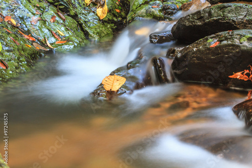 Fototapeta Naklejka Na Ścianę i Meble -  waterfall and rocks covered with moss