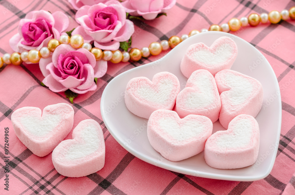 sweet heart shape of pink marshmallows with flower. sweet heart shape of pink marshmallows with flower.