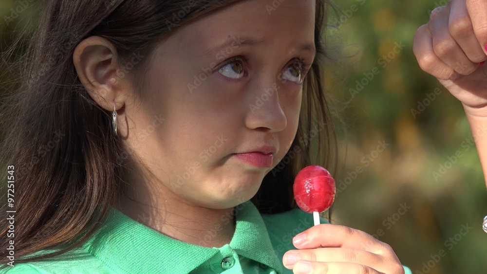 Girl Eating Lollipop Candy