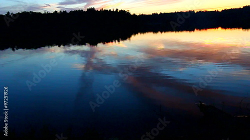 Beautiful sunset seen over Buffalo Lake of northwoods Wisconsin photo