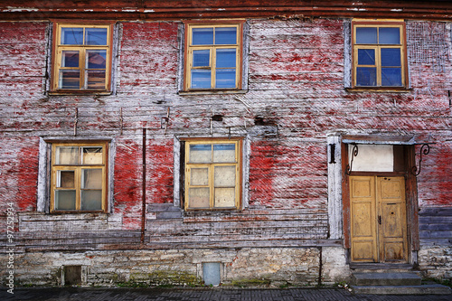 facade of an old abandoned wooden house