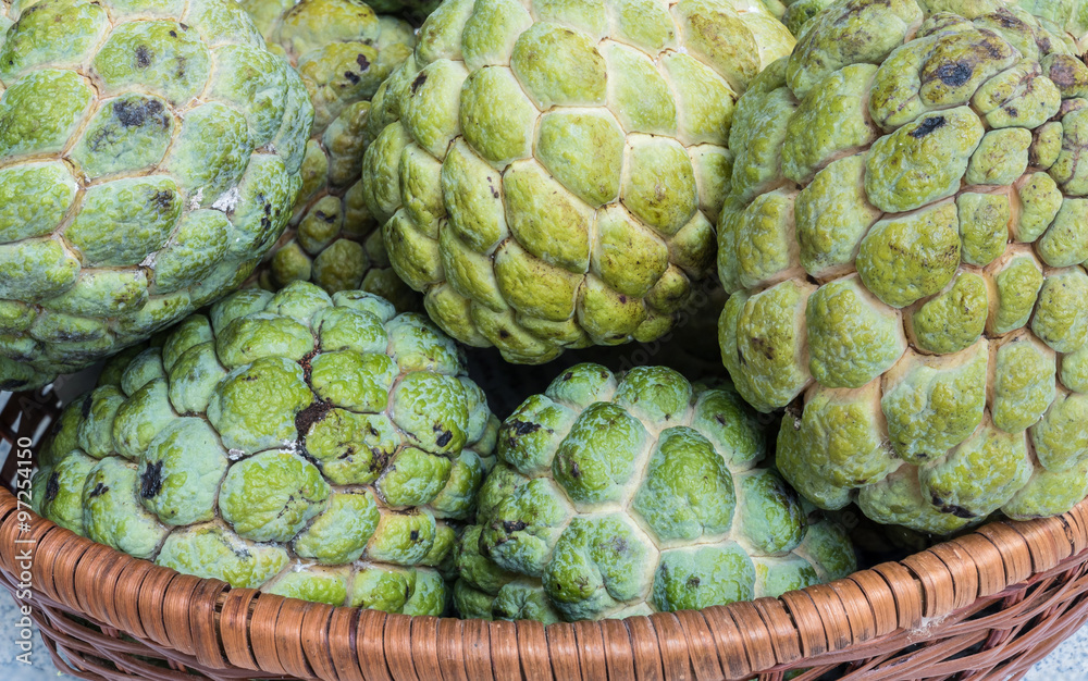 Obraz premium Closeup green custard apple textured background