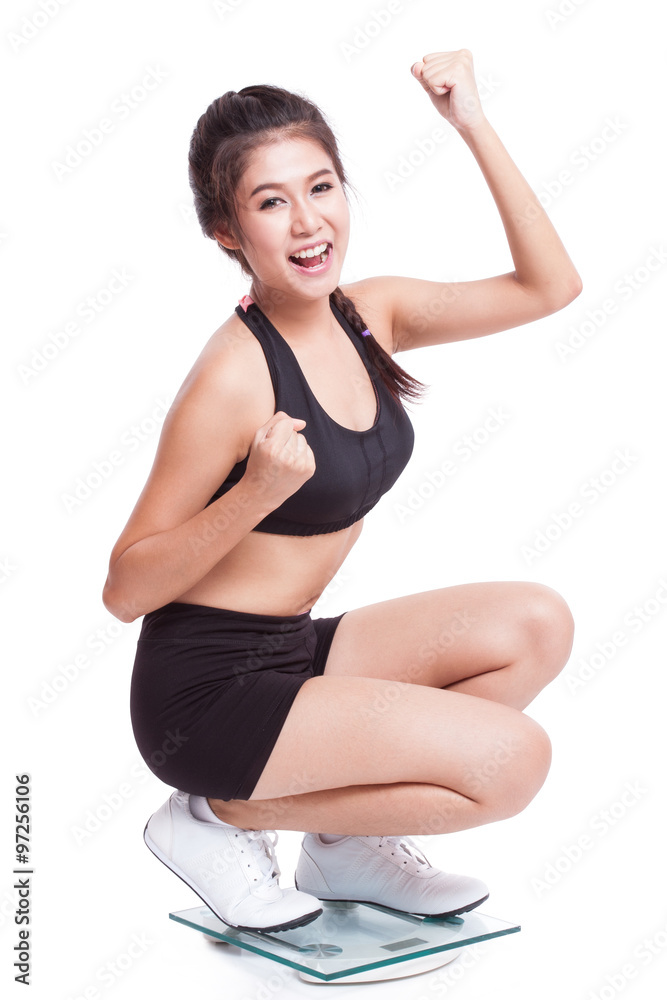 Happy woman with scales on white background Happy woman with scales on white background