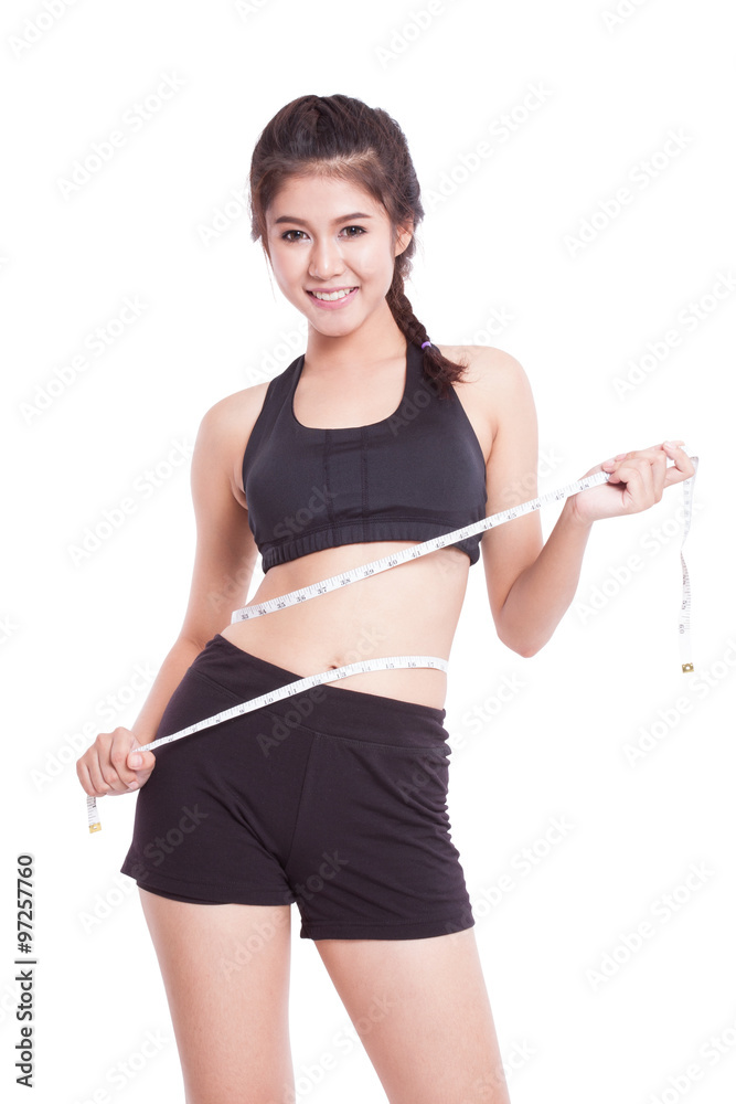 Fitness young woman taking measurements of her body. healthy concept Fitness young woman taking measurements of her body. healthy concept