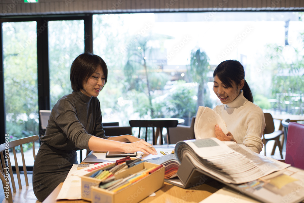 Two women are choosing the dough Two women are choosing the dough