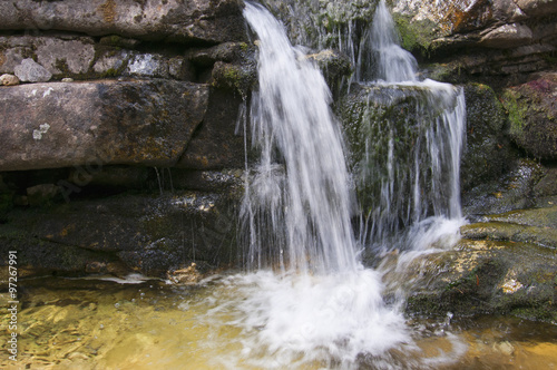 Small creek stream and blur waterfall