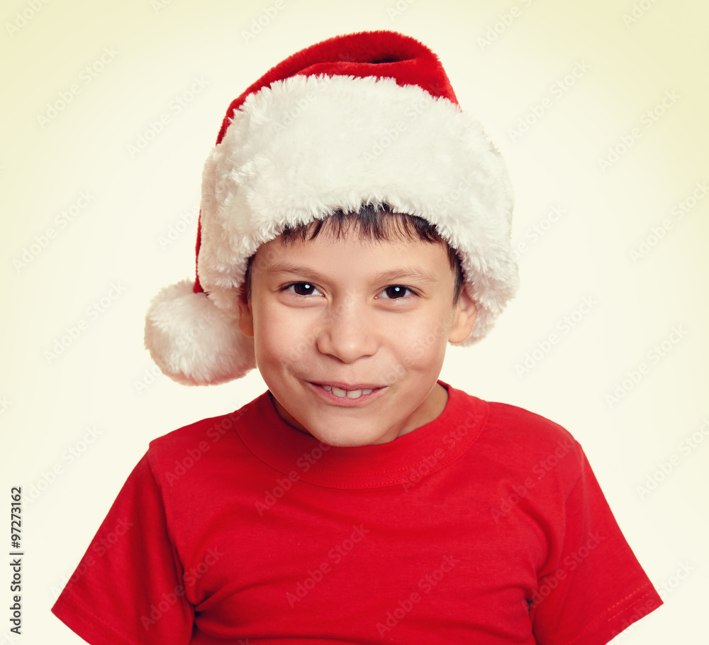 boy in santa helper hat portrait - winter holiday christmas concept boy in santa helper hat portrait - winter holiday christmas concept