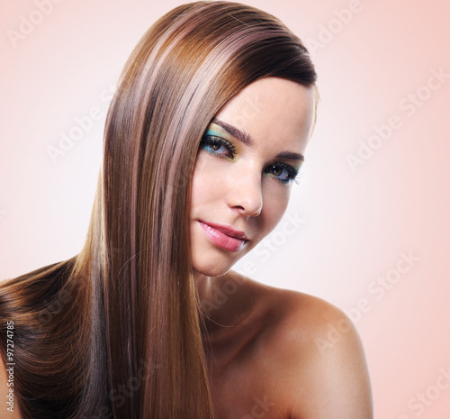 Portrait of beautiful woman with long straight hairs