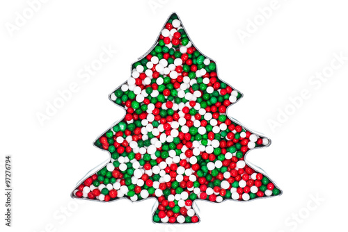 christmas tree cookie cutter with sugar sprinkles