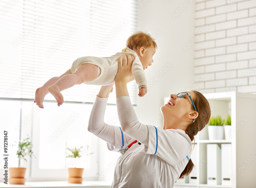 Fototapeta premium doctor examining a baby