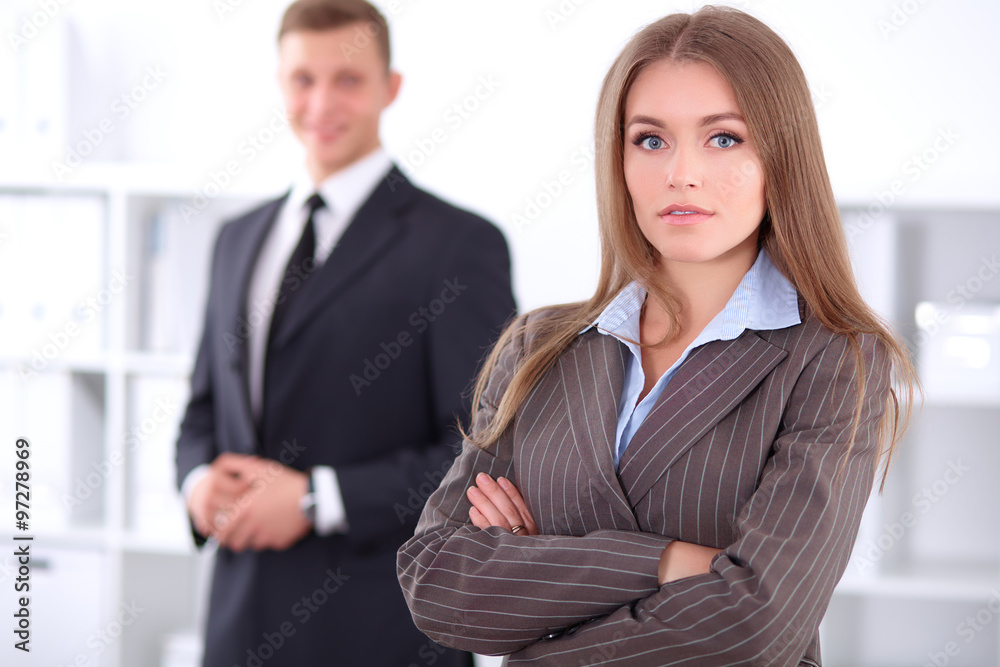 Face of beautiful business woman on the background of business people Face of beautiful business woman on the background of business people
